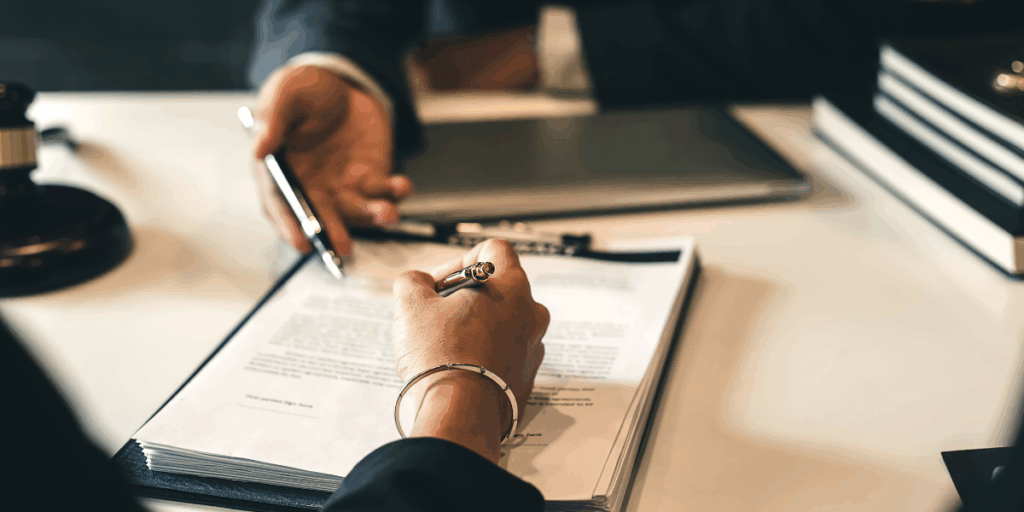 A business contract being signed.