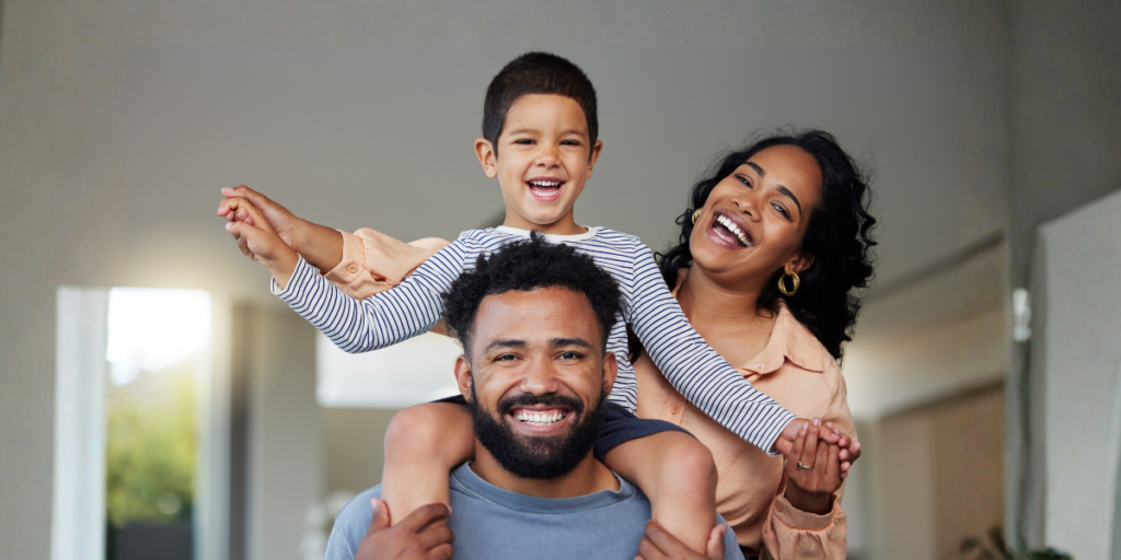 A blended family, representing a stepparent who has adopted their spouse's child in North Carolina.